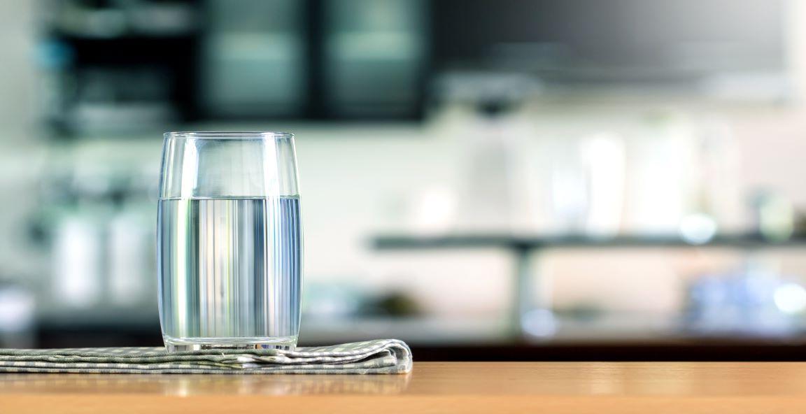 A glass of pure water placed on a table